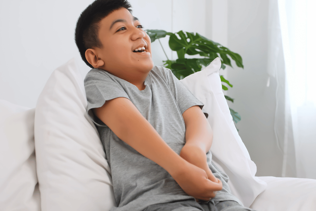 Smiling mother with young baby